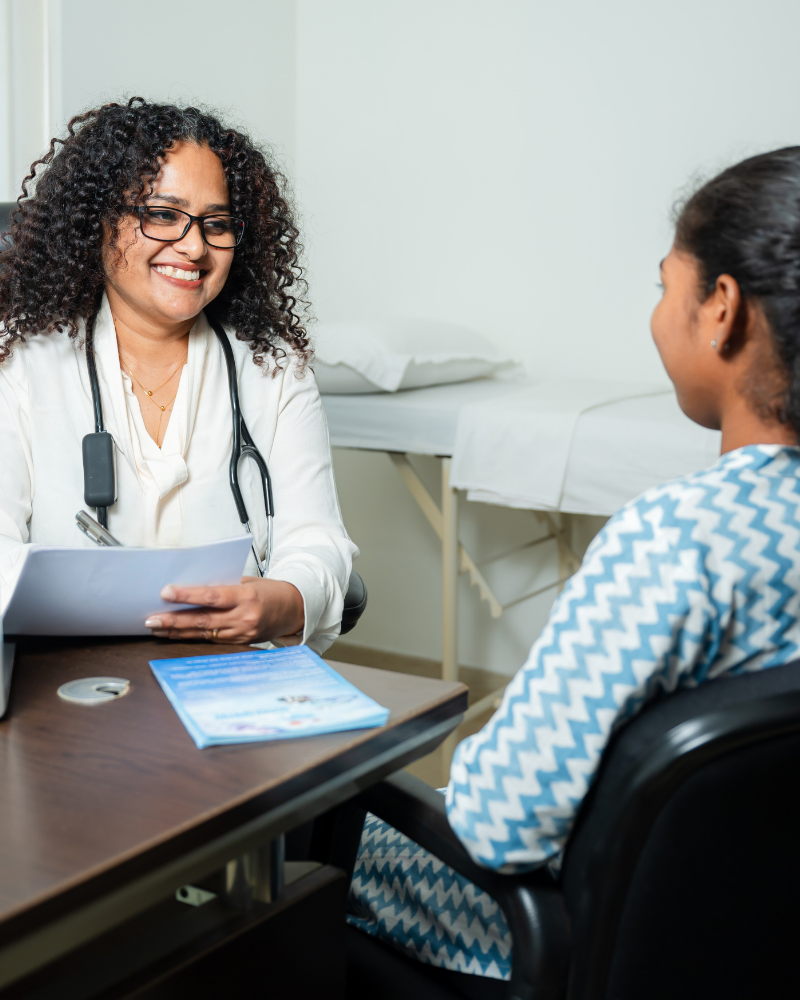 Dr. Melita Frank with patient